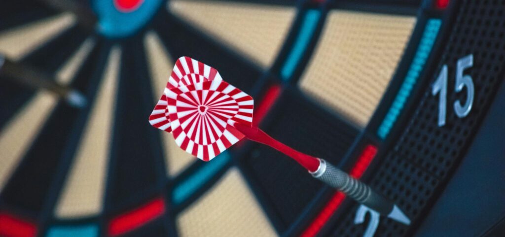 Red and White Dart on Darts Board